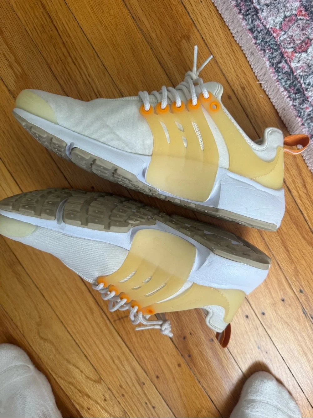 Nike Women’s White and Orange Casual Slip-On Sneakers